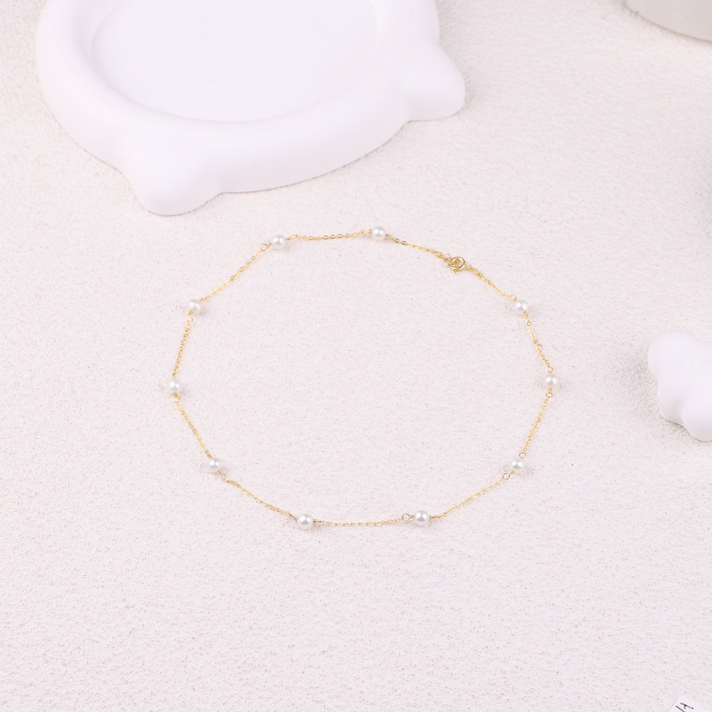 Collier ras du cou à dix perles 