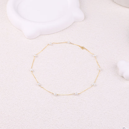 Collier ras du cou à dix perles 