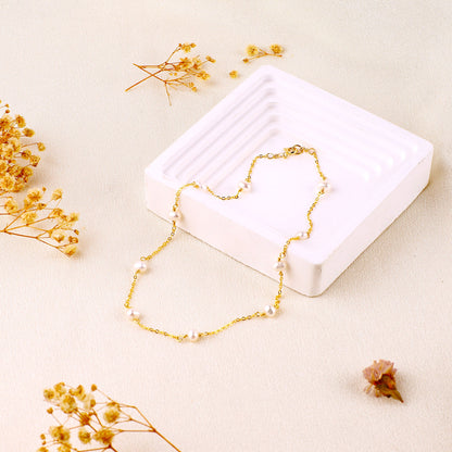 Collier ras du cou à dix perles 